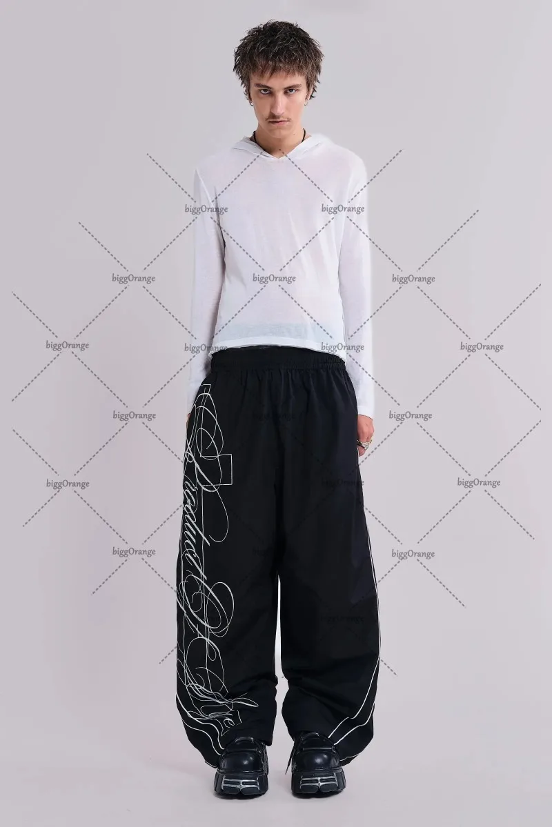 Nuevos pantalones de pierna ancha holgados de cintura alta Harajuku con letras de Hip-hop europeas y americanas para hombre, pantalones de chándal de gran tamaño Y2K a la moda informal para mujer