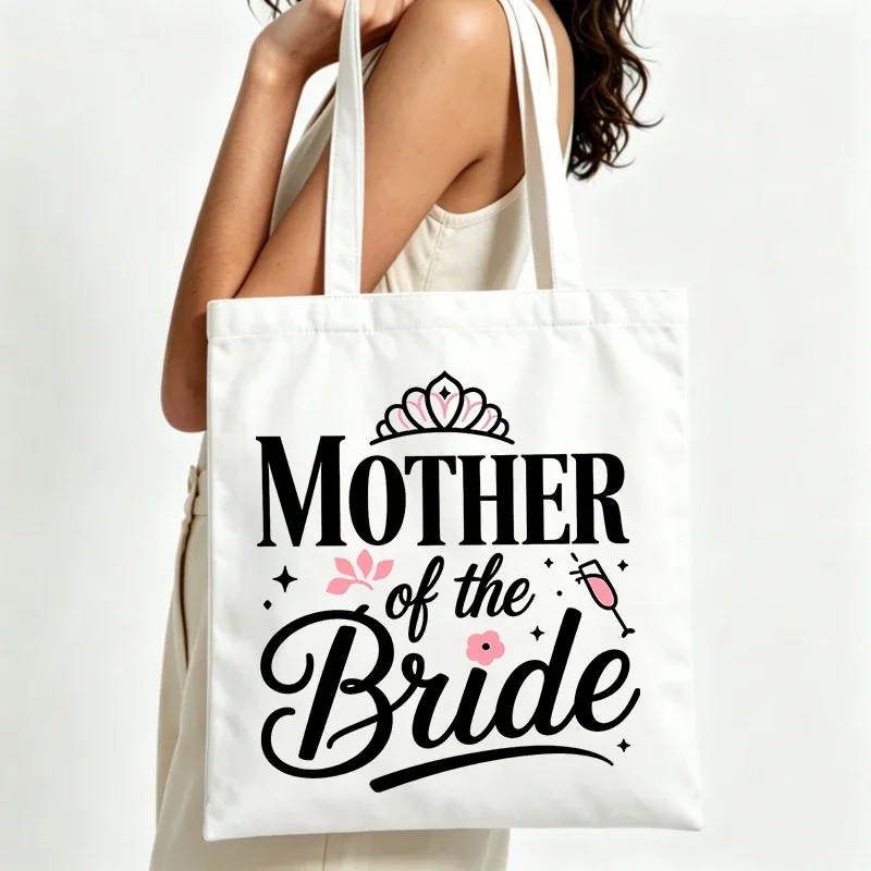 Mother of the Bride themed canvas tote bag with tiara graphic, perfect for wedding events and bridal showers
