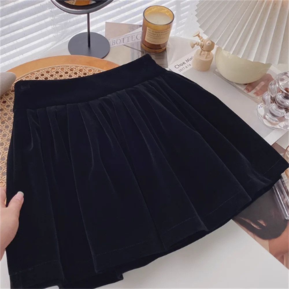 

High-waisted pleated gold velvet black A-line skirt women