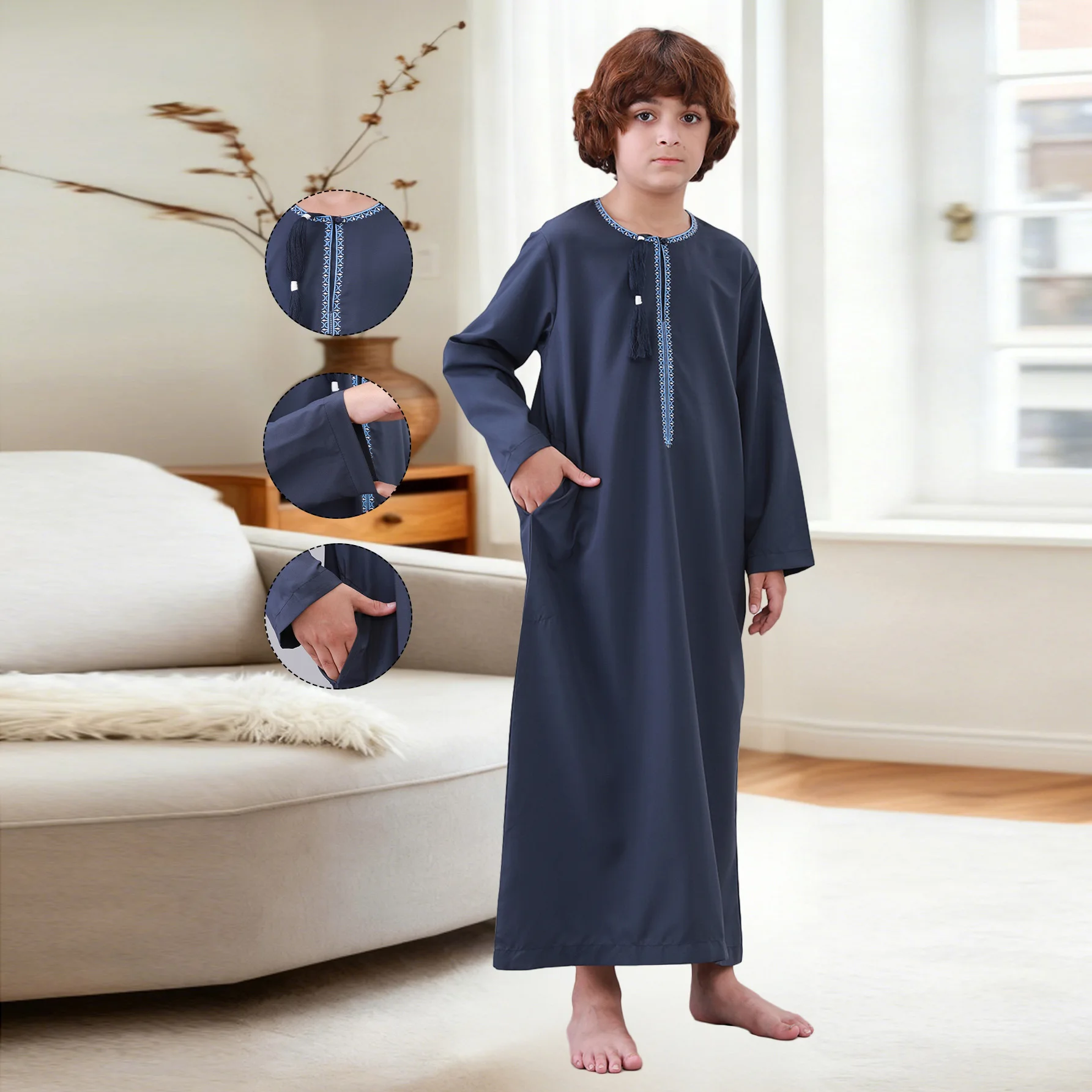 Close-up of the embroidery and tassel embellishment on a boys' jubba thobe.
