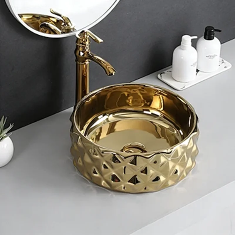 حوض غسيل سيراميك ذهبي أنيق، حوض غسيل سيراميك بتصميم دائري - مثالي لتركيبات الحمام الحديثة، مناسب لغرف الملابس والزينة والحمامات #1