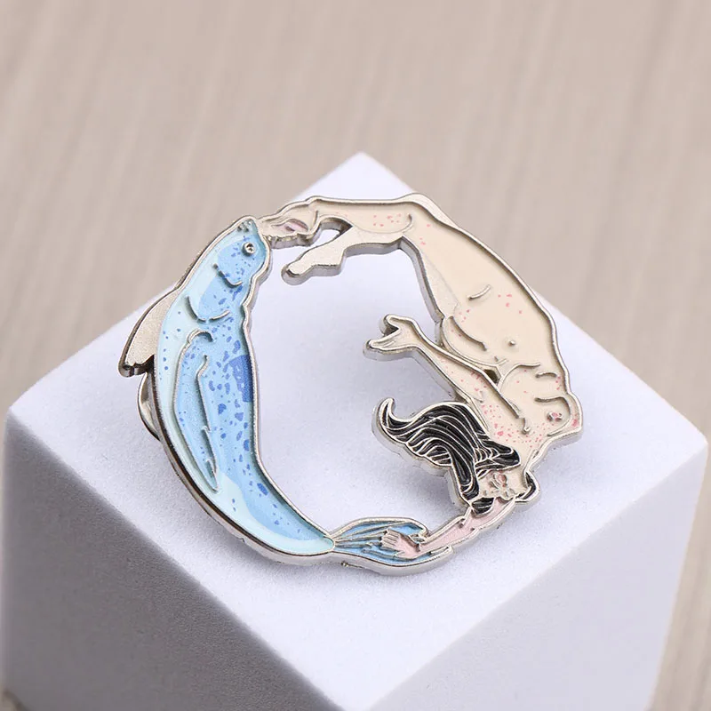 Enchanting Mermaid - Dolphin Enamel Pin.Great for wearing at beach parties or as an everyday accessory with a nautical touch.