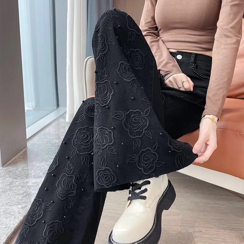 

Early Spring New Embroidered Slim Wide Leg Flared Denim Jeans Women's Black Embroidered Flowers Ladies Jeans Flared Pants