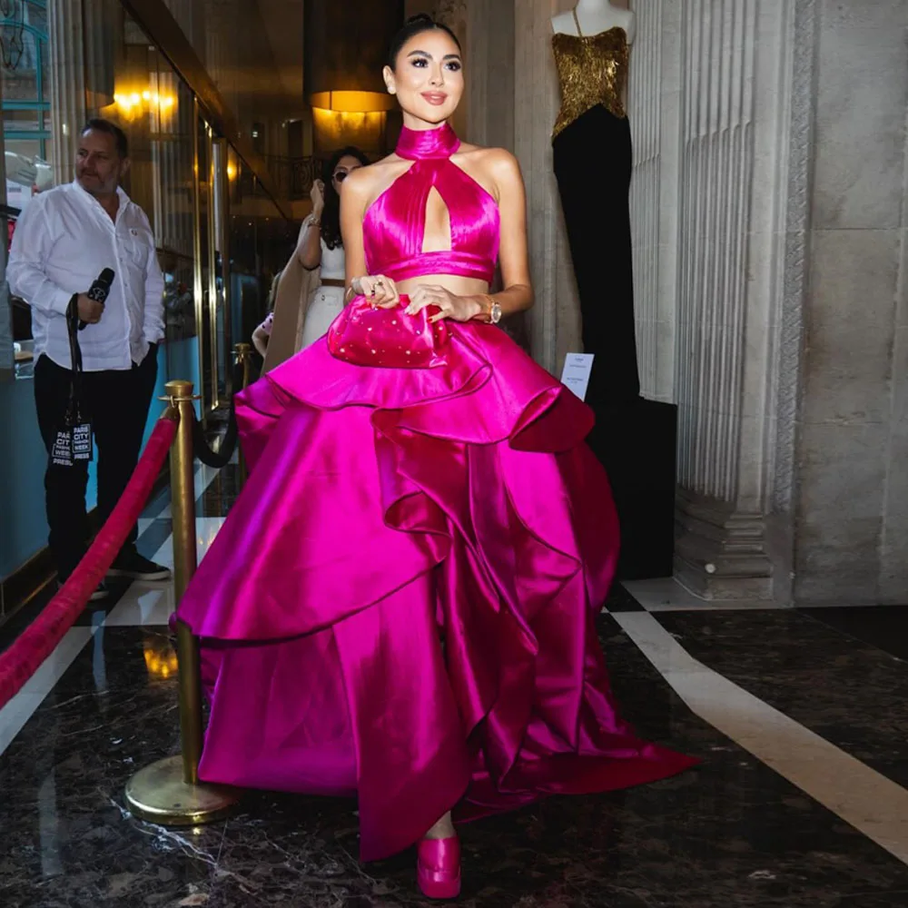 

Pink Satin Dress With Ruffled Layers And Asymmetrical Hemline Features Bold Design And Luxurious Fabric Paired With Matching Top