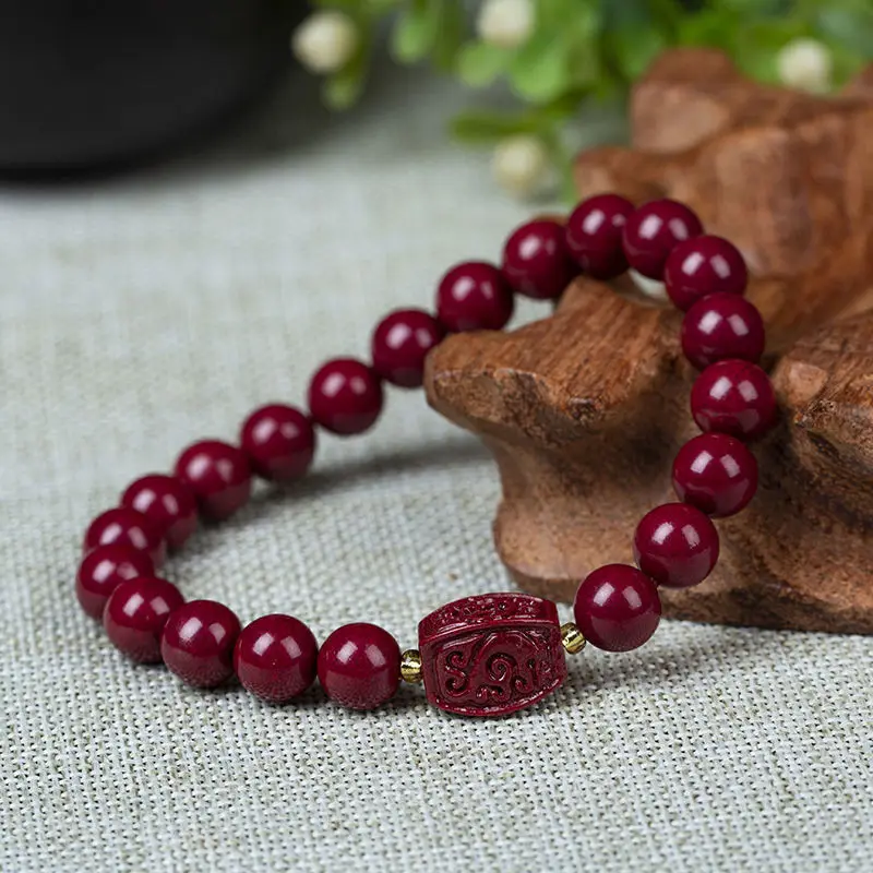 

Natural Raw Mineral Cinnabar Dragon Pattern Round Beads Bracelets Popular Joker Bracelets for Men and Women.