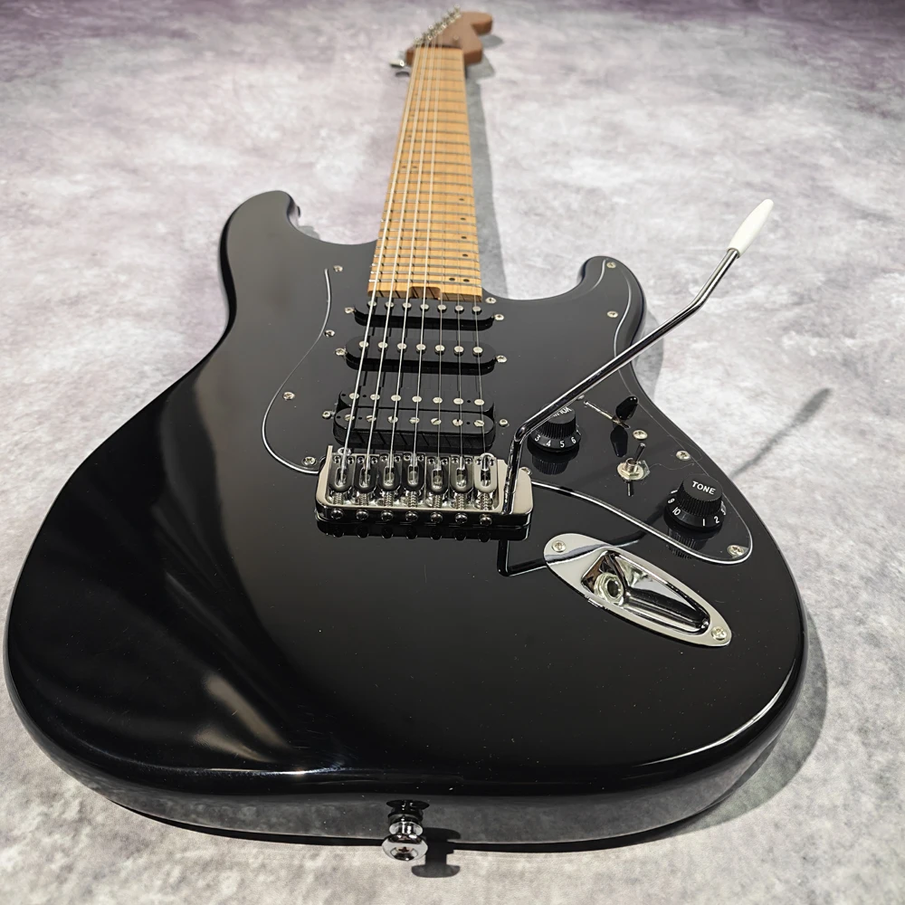 7-string high-quality electric guitar; maple neck; tailpiece fine tuners; brass heavy-duty bridge; 9-tone circuit