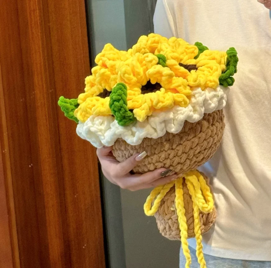 

DIY crochet sunflower bouquet, handmade bouquet, rose gift for women, made with icing yarn and crochet hooks.