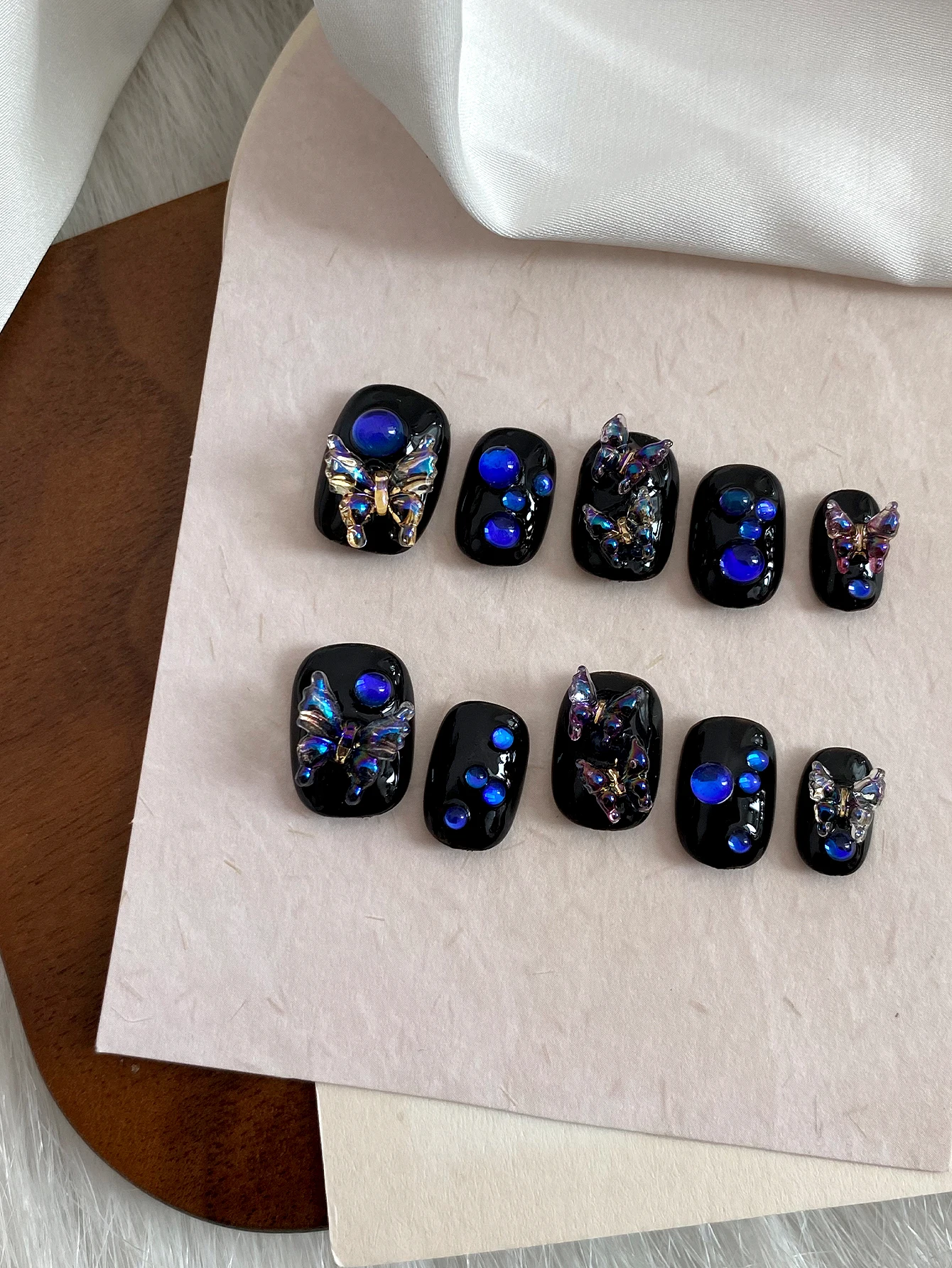 Cool Aurora Butterfly Wearable Nails, Short Square Glossy Black Press On Nails, Shiny Blue Gem Accents, Dark Aesthetic Nail Art