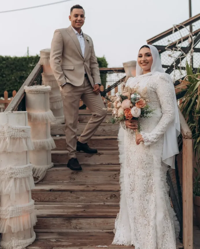 Abiti da sposa Boho caftano musulmano a sirena Abiti da sposa in pizzo all'uncinetto con volant a maniche lunghe Medio Oriente Hijab Abito da sposa personalizzato