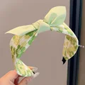 3  green bow flower