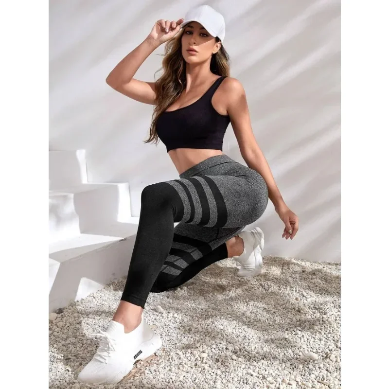 Leggings a righe nere Collant slim senza cuciture da donna Allenamento da palestra Corsa Vita alta Sollevamento fianchi Pantaloni fitness yoga lavorati a maglia