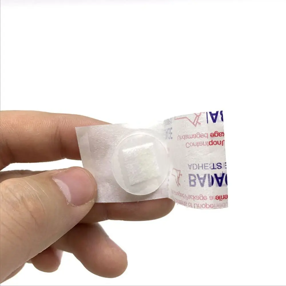 100Pcs 뜨거운 미니 방수 BandAid 통기성 둥근 모양 접착 붕대 상처 첫 번째 고정 테이프 상처 드레싱