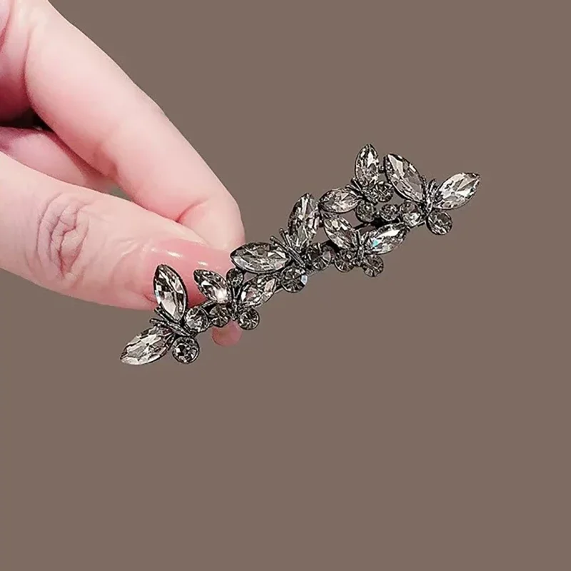 Elegante schwarze Strass Kristall Schmetterling Federklammer High-End-Haarspange Damen Hinterkopf halbgebundene Haarnadel Haarschmuck