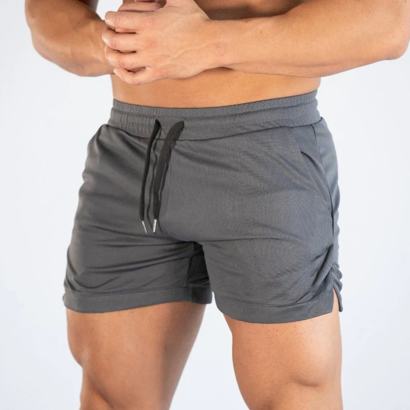 Cross border sports shorts, men's European and American style fitness pants, thin casual running mesh quick drying breathable ti