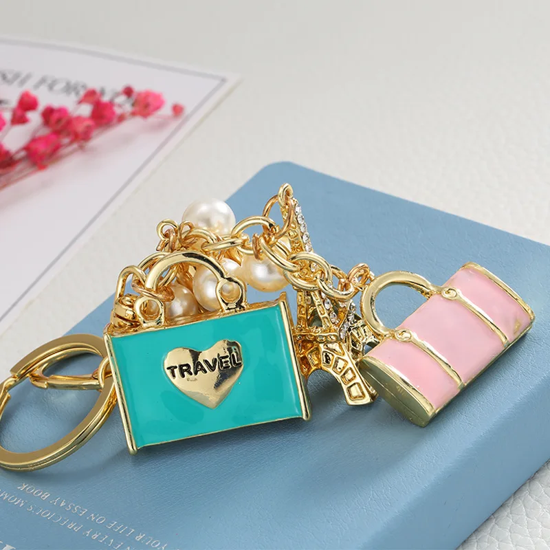 luxury jewelry New alloy pendant fashion travel handbag keychain aircraft tower accessories car bag pendant trending jewelries