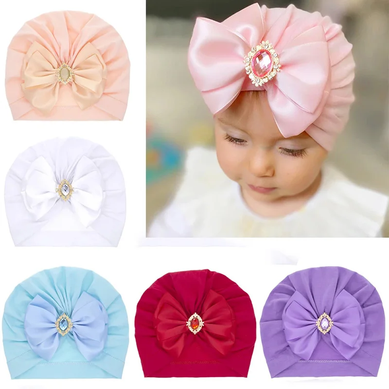 

Baby Nylon Big Bow Turban Hats India Beanie Bohemia Donuts Cap Girls Headwear Bun Knot Baby Hats Caps Big Bow Turban