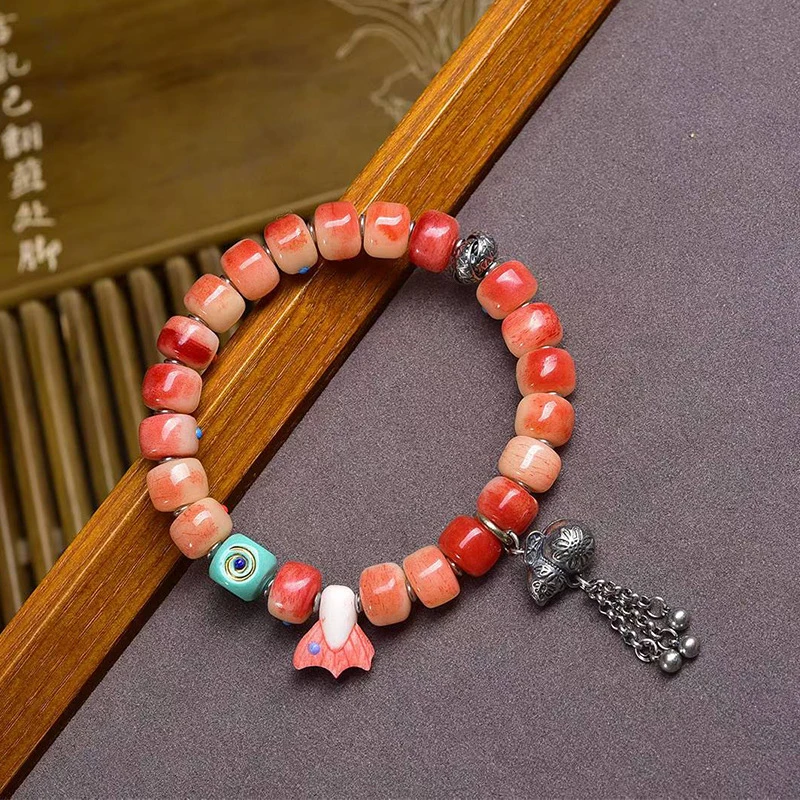 

Inlaid bracelet with semi-genuine bone beads, single-loop Tibetan-style 999 silver, glass, and turquoise accessorie
