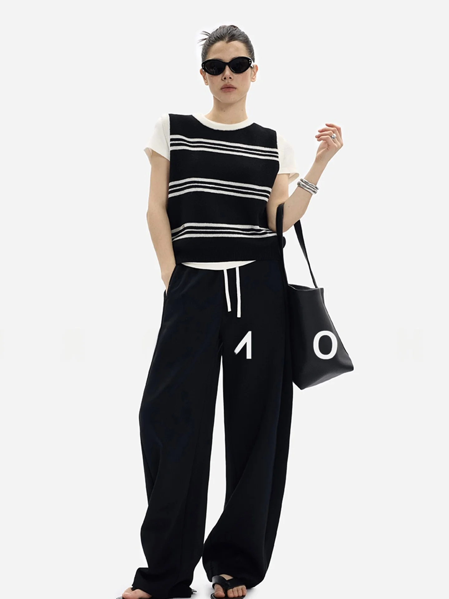 Okrągła dzianinowa kamizelka 2025 Jesień Kolor Colion Luksusowa Prosta Damska Bluzka Bez Rękawów Wyszczuplająca Lekka Kamizelka