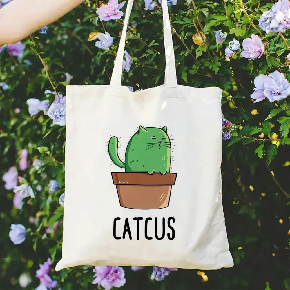 Sac fourre-tout Freedom Butterfly avec citation inspirante et imprimé d'ailes florales, sac graphique sur le thème de l'empowerment, sac graphique botanique élégant