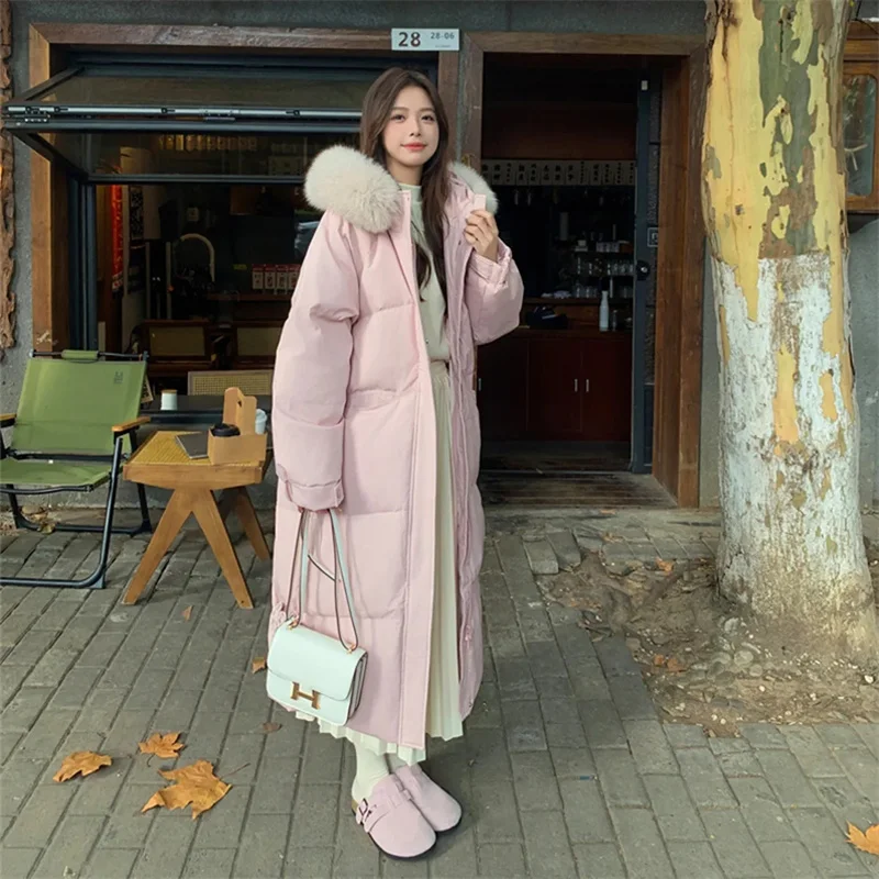 Winterjas Warme bontkraag Capuchon Dames Parka Mode Ritszakken Ontwerp Lange jas Elegante slanke dikke vrouwelijke jassen