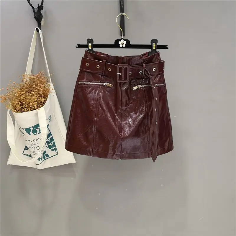 

Retro brown pu leather skirt women's 2025 autumn and winter new Spice Girl a-word tight hip skirt women clothing