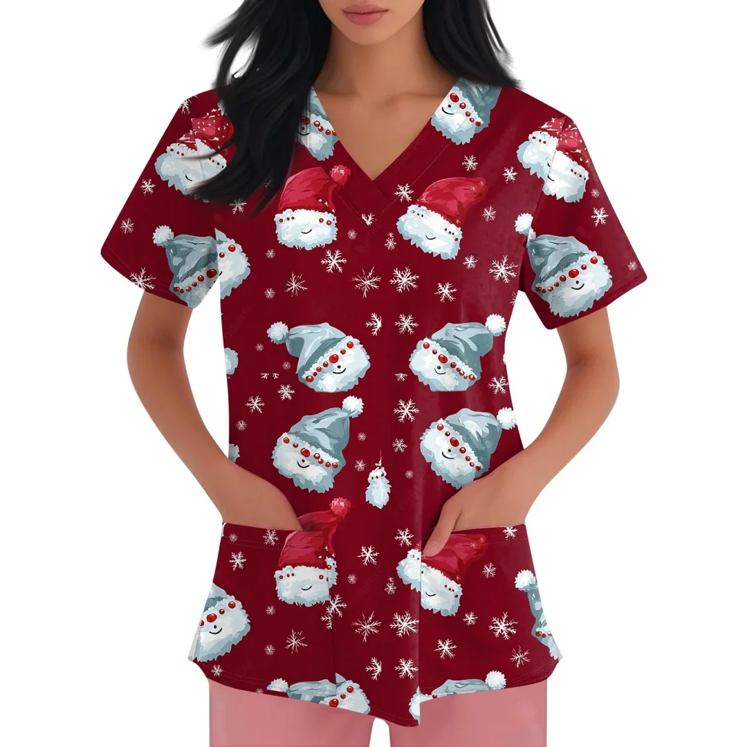 เสื้อยืดพยาบาลแขนสั้นลายคริสต์มาสสำหรับผู้หญิง ลายซานต้า เกล็ดหิมะ ขนมปังขิง คอวี มีกระเป๋า ของขวัญสำหรับพยาบาล
