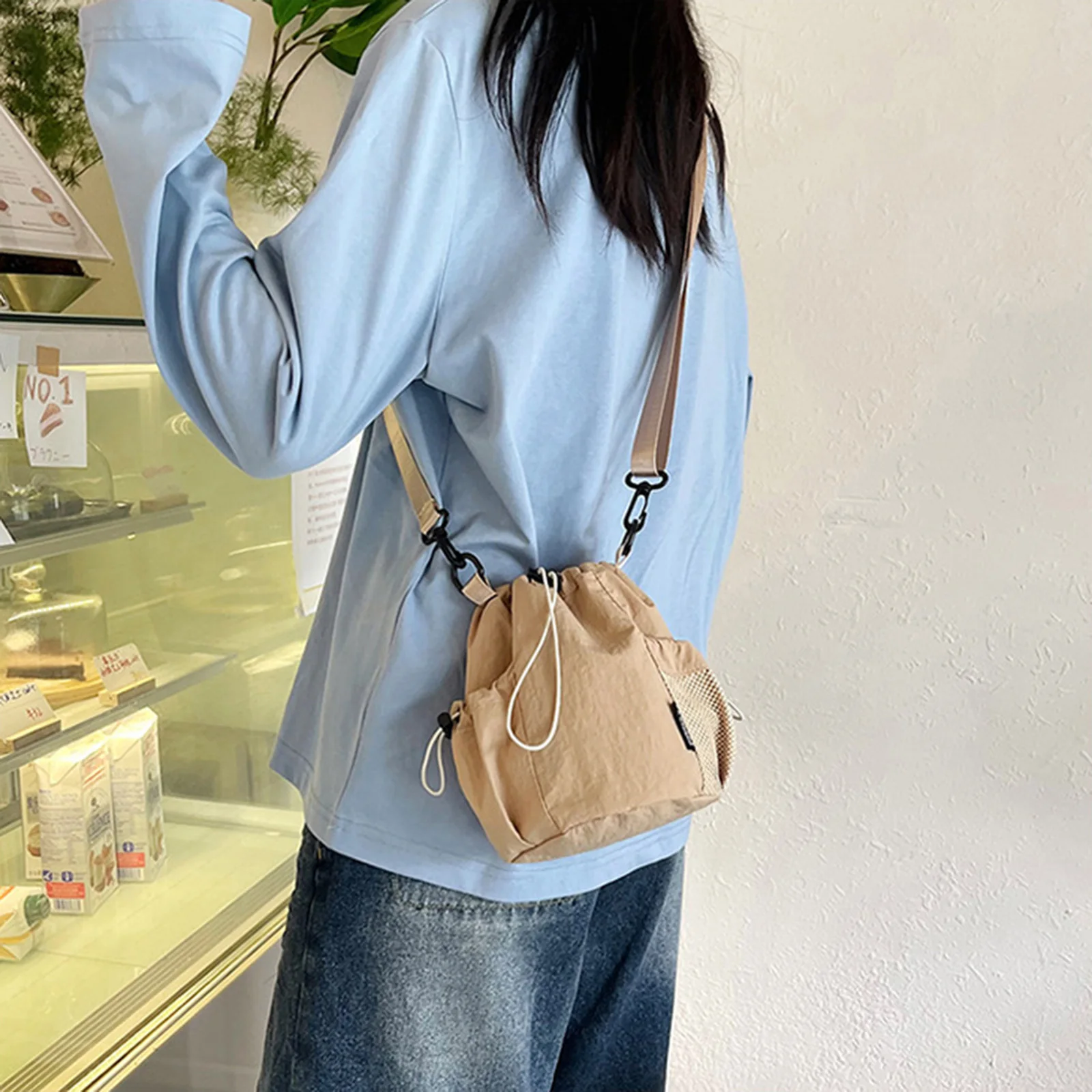 Nylon crossbodytas met trekkoo - Bucket Bag Suede recensie en prijs