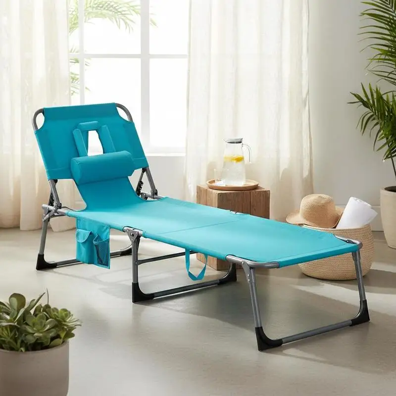 Chaise de bronzage pliable turquoise avec ouvertures pour le visage et les bras, dossier inclinable, structure métallique robuste antidérapante, poche de rangement et oreiller amovible, adaptée à la plage, au bord de la piscine et à la terrasse.