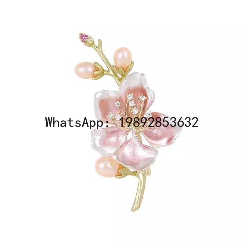 

women's brooch featuring a delicate pearl and peach blossom design, perfect as a corsage or pin for suits and accessories