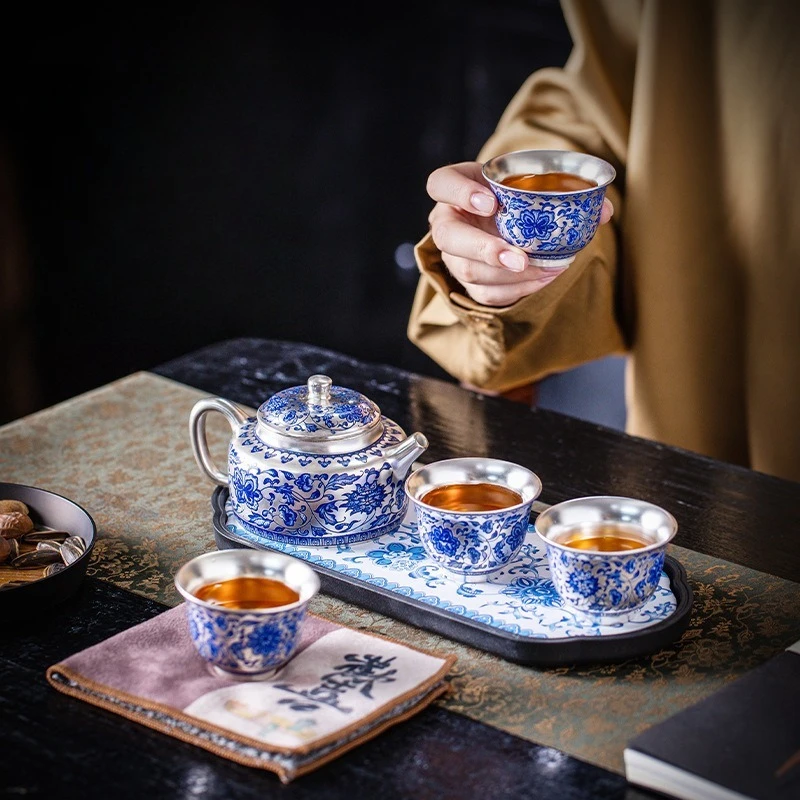 Sterling silver twisted lotus, a pot of four cups, household Chinese style Kung Fu tea set, ceramic tea maker