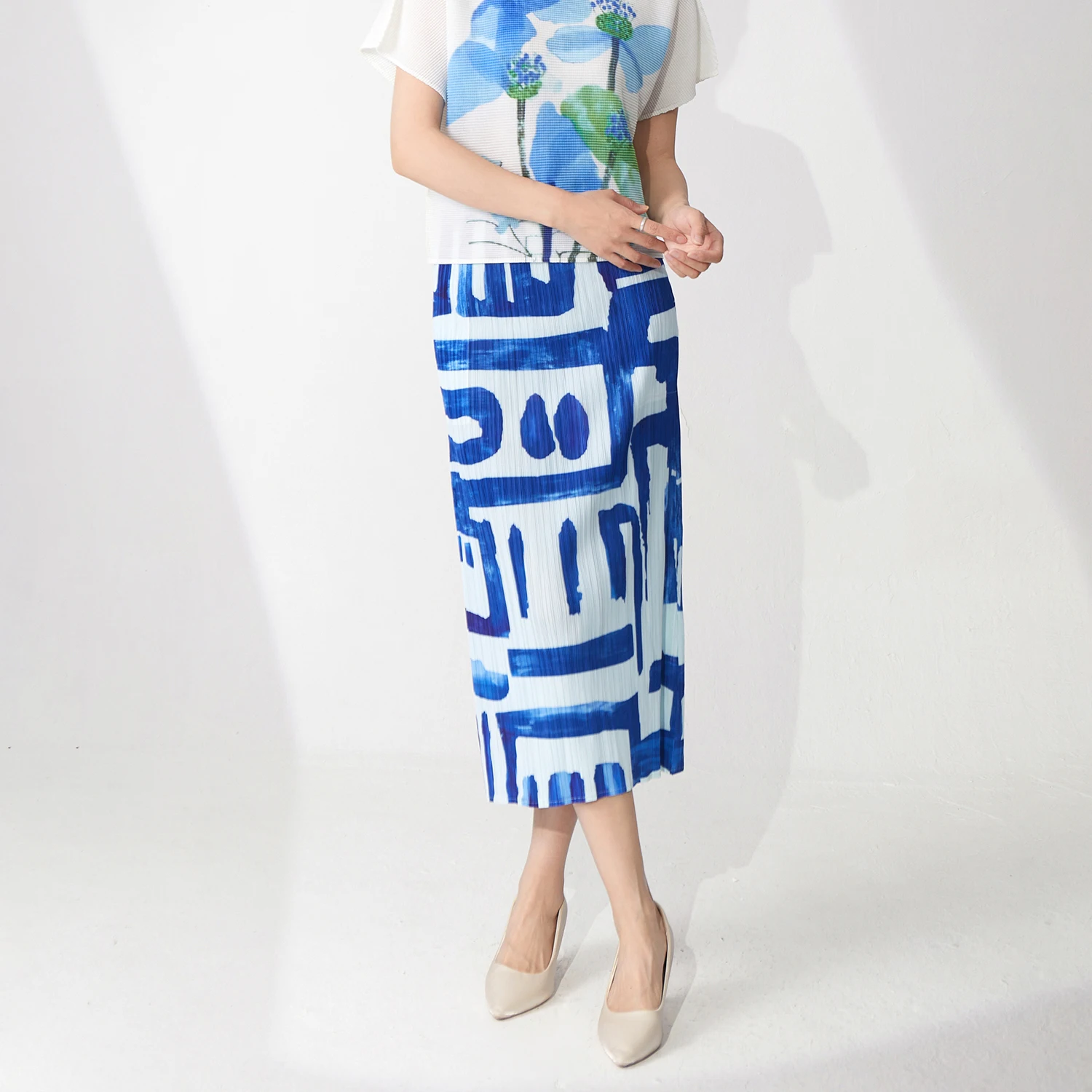 2025 summer new women's printed fashion temperament straight skirt design casual three-bedroom pleated skirt