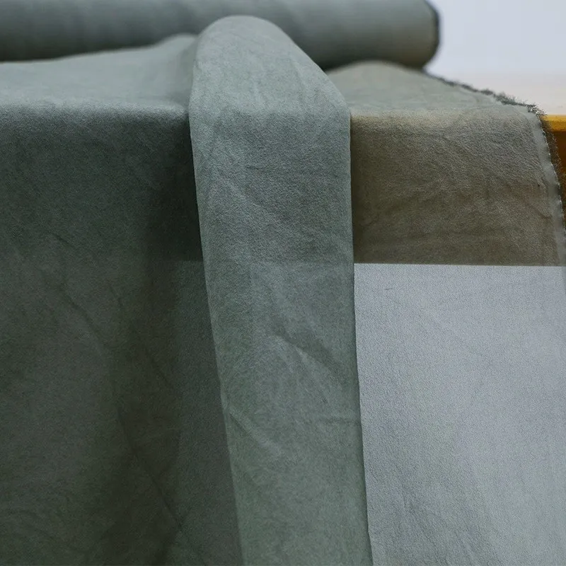 

10 momme georgette silk fabric with a mottled light slightly stiff and wide dirty dyed