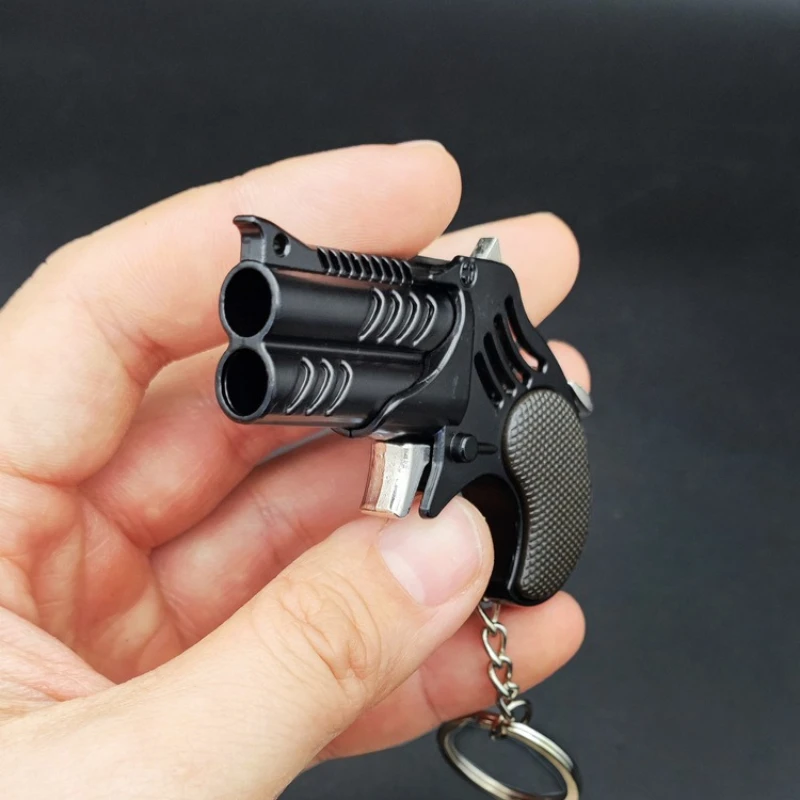 1Pcs Mini Keychain Metal Rubber Band Gun Game Toy Gun Launcher Adult Simulation Pistol Toys Gifts Pendent - view 6