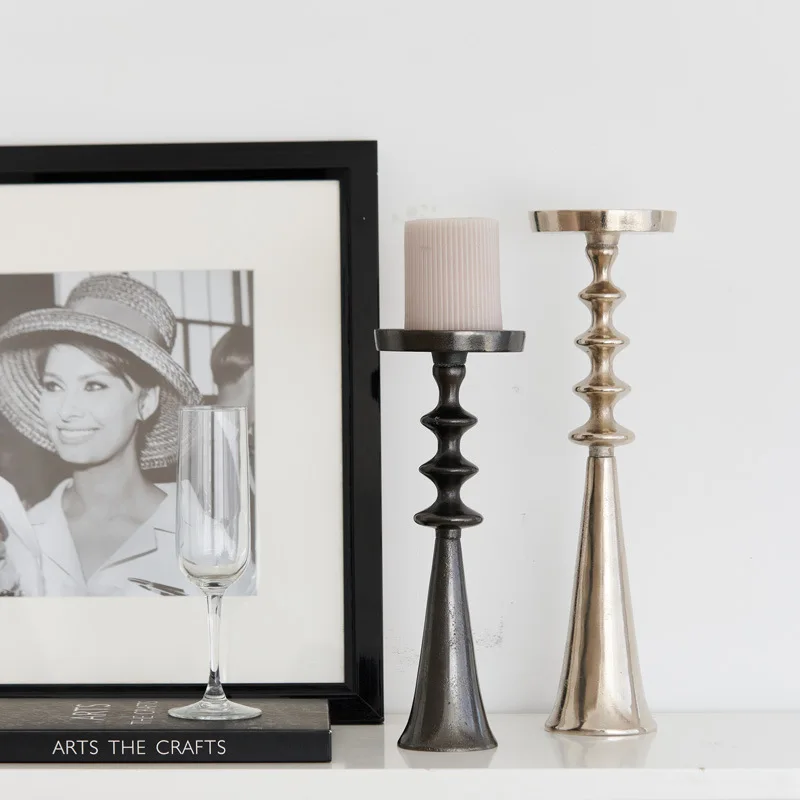 Modern light luxury gold and silver tall candle holder, home decoration scene layout atmosphere metal candle holder