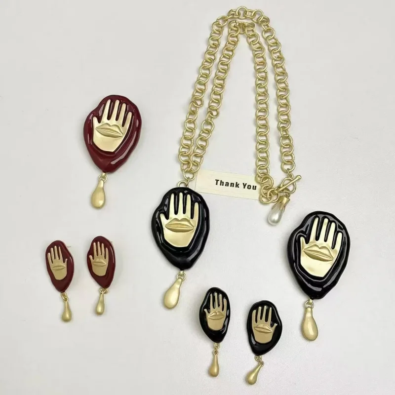 

Shapkin Artistic Retro Gold Drop Oil Unique Handprint Lip Pendant Necklace And Earrings for Women Fashion Commute Accessories