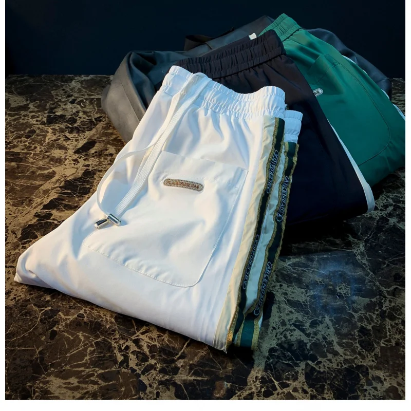 

2025 Summer Light Luxury Casual Pants, Men's Elastic Leg Tight Fit, Trendy Brand, Side Stripe Design, Sports Pants