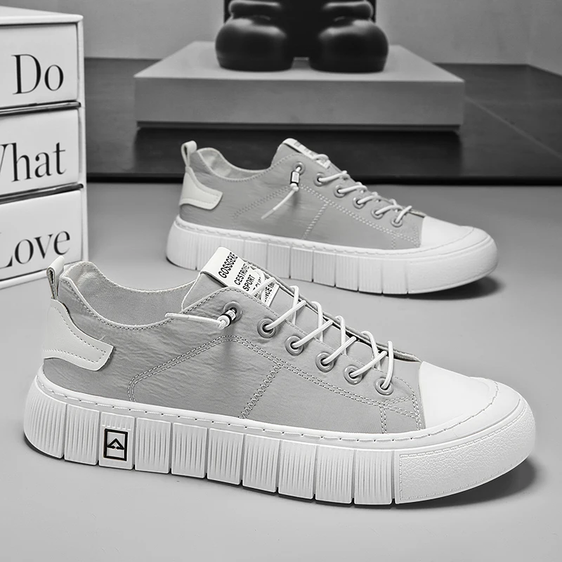 

Men Breathable Canvas Slip On Sneakers Low Top White Casual Sports Shoes for Summer