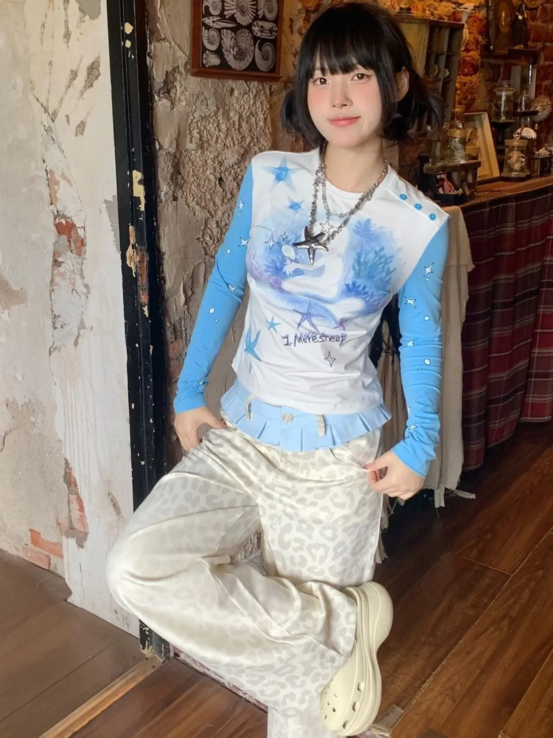 Y2K-pantalones con estampado de leopardo para mujer, pantalón holgado de pierna recta, diseño adelgazante con falda superpuesta, pantalones de moda en capas