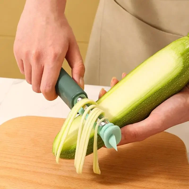 الإبداعية سبعة في واحد متعددة الوظائف مقشرة المطبخ المنزلية الفاكهة والخضروات تمزيق الذيل الفولاذ المقاوم للصدأ فتاحة الزجاجات