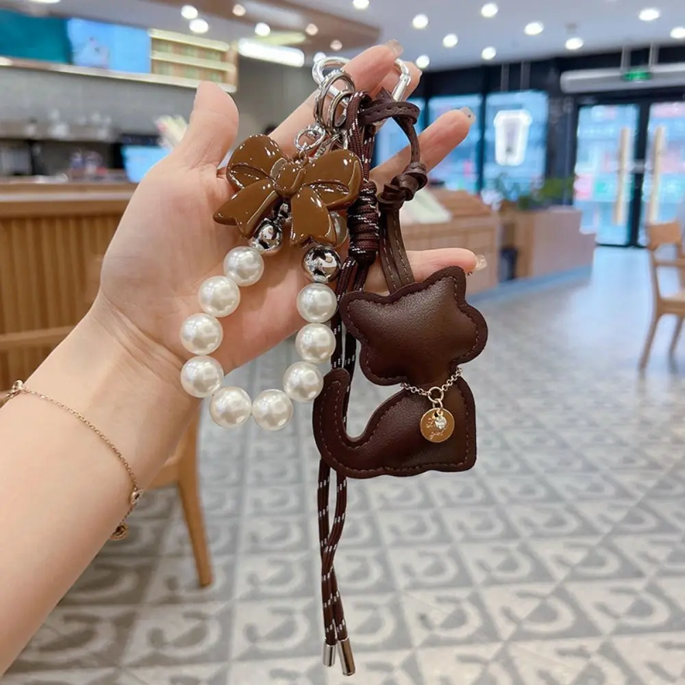 

Pearl Bead String Cartoon Cat Pendant Bowknot Cute Braid Rope Keychain Creative PU Leather Bag Hanging Accessory Bag Decoration