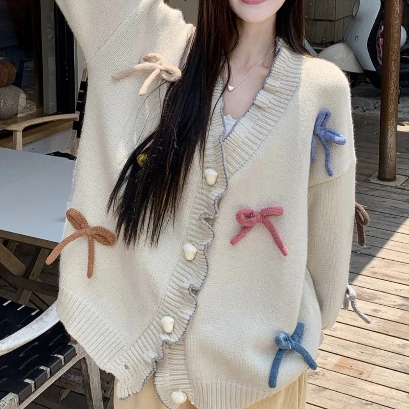 

2025 New Sweet Age-reducing Three-dimensional Bow Sweater for Women with A Sense of Wood Ears Loose Knitted Jacket