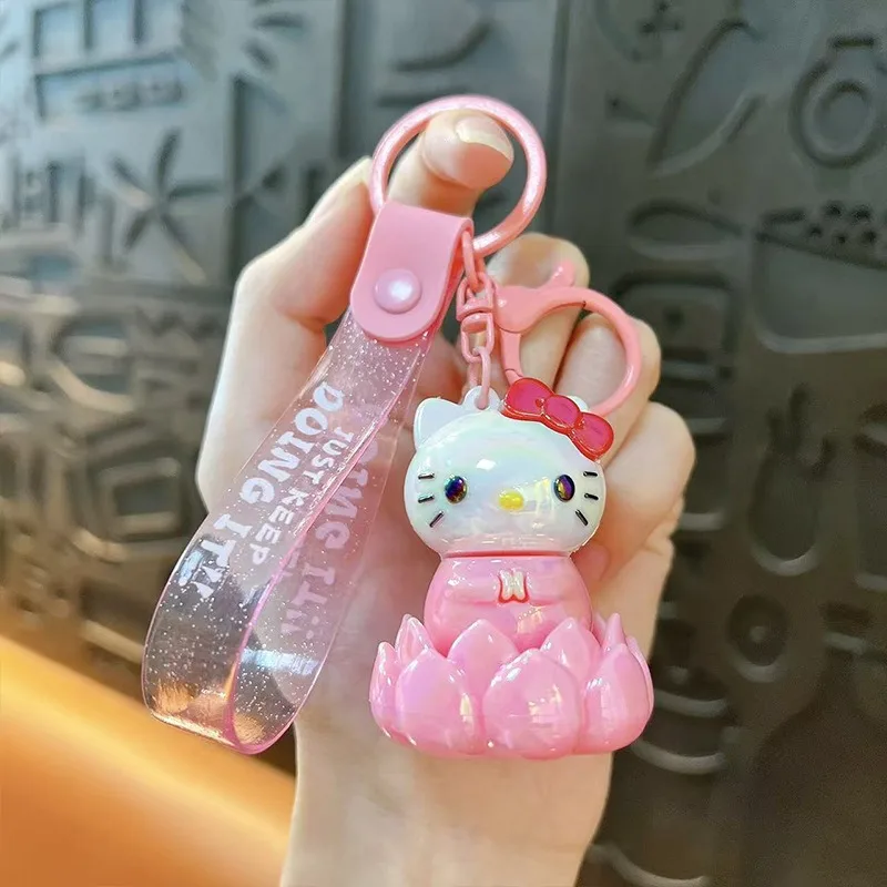 サンリオ漫画ハローキティロータスターンアラウンドキーホルダーかわいいポチャッコデイリーバックパックパーソナライズされたファッションアクセサリー