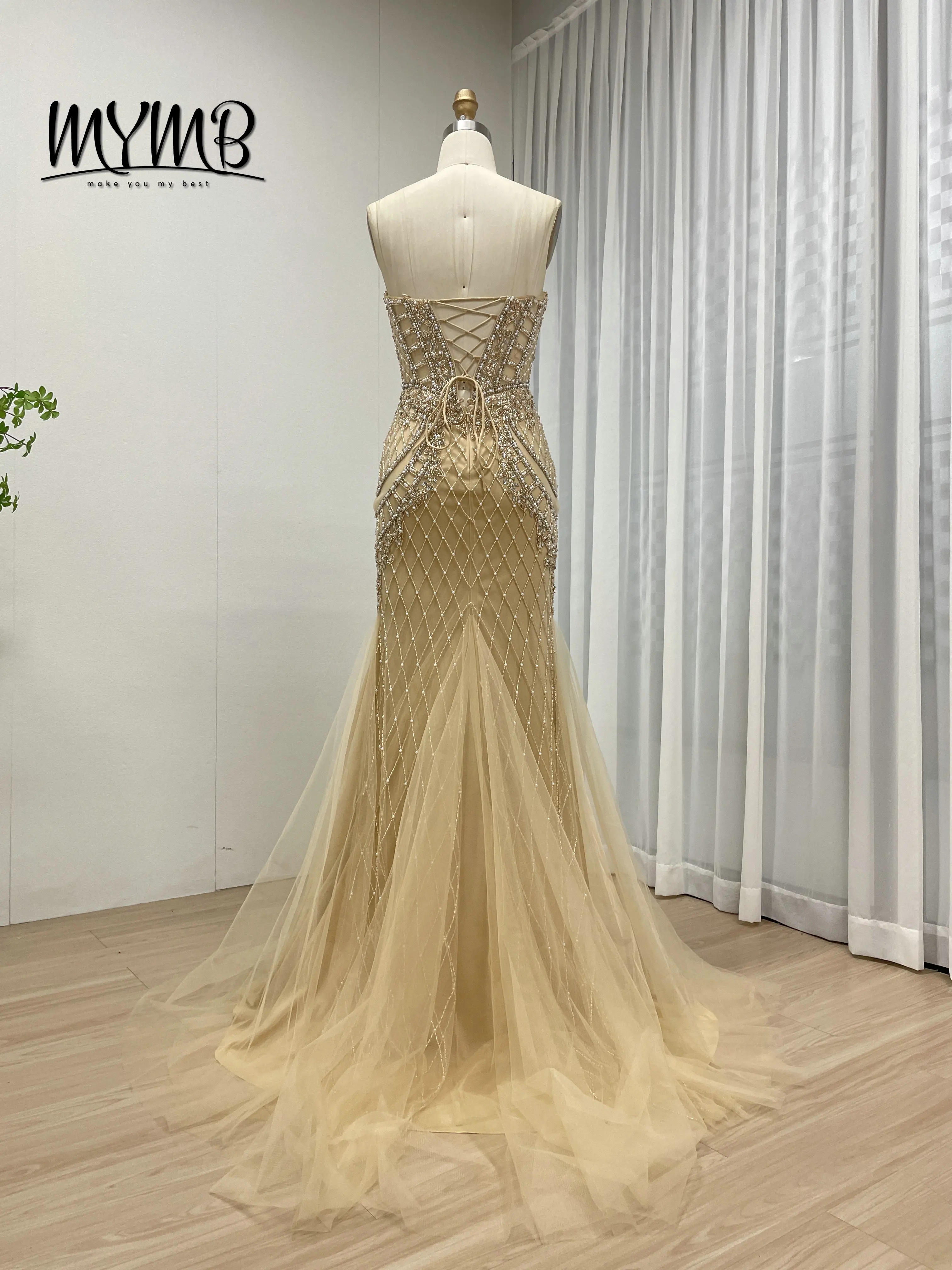 MYMB Impresionante vestido de noche sin mangas color champán dorado con entramado y cuentas de cristal corte sirena tren de tul transparente para graduación MB40406