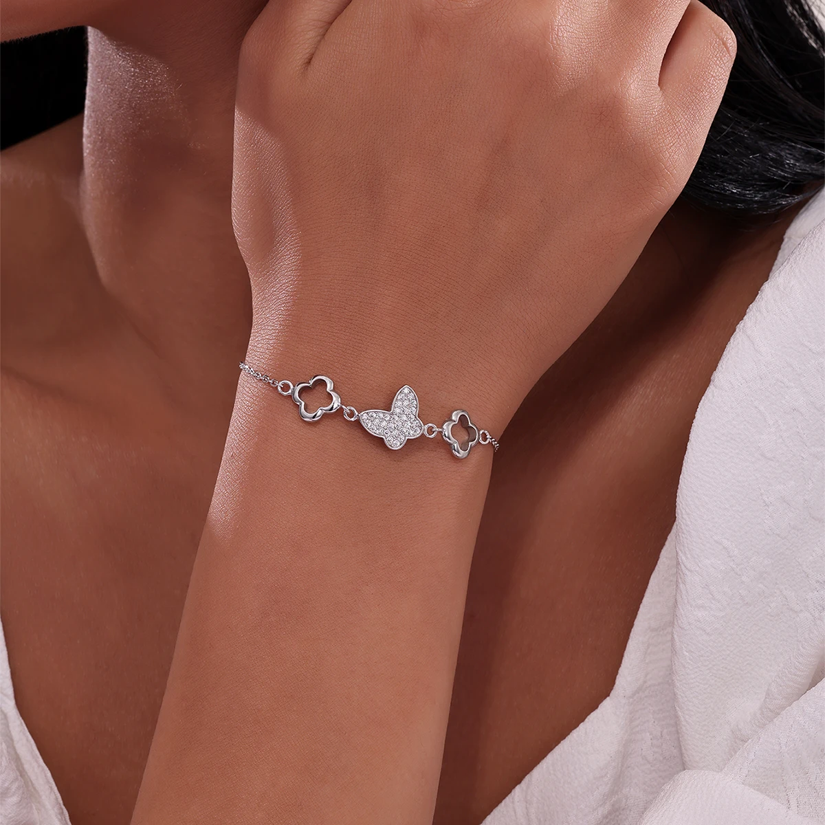 

A fashionable boutique 925 sterling silver women's butterfly hollowed out flower chain bracelet for parties, sweet and romantic