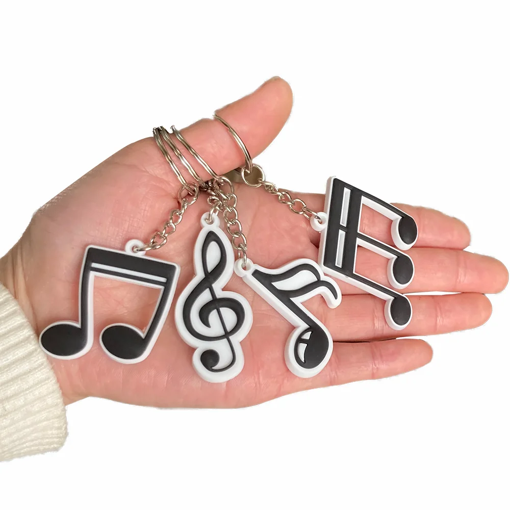 Decorazioni per feste a tema musicale nota musicale palloncino nota tovaglia bracciali in Silicone portachiavi nero bianco musica forniture di