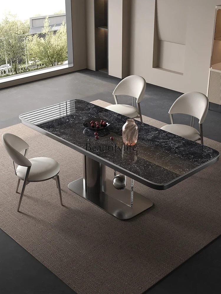 

Light luxury rock slab dining table Italian minimalist household high-end luxury stone designer modern simple dining table