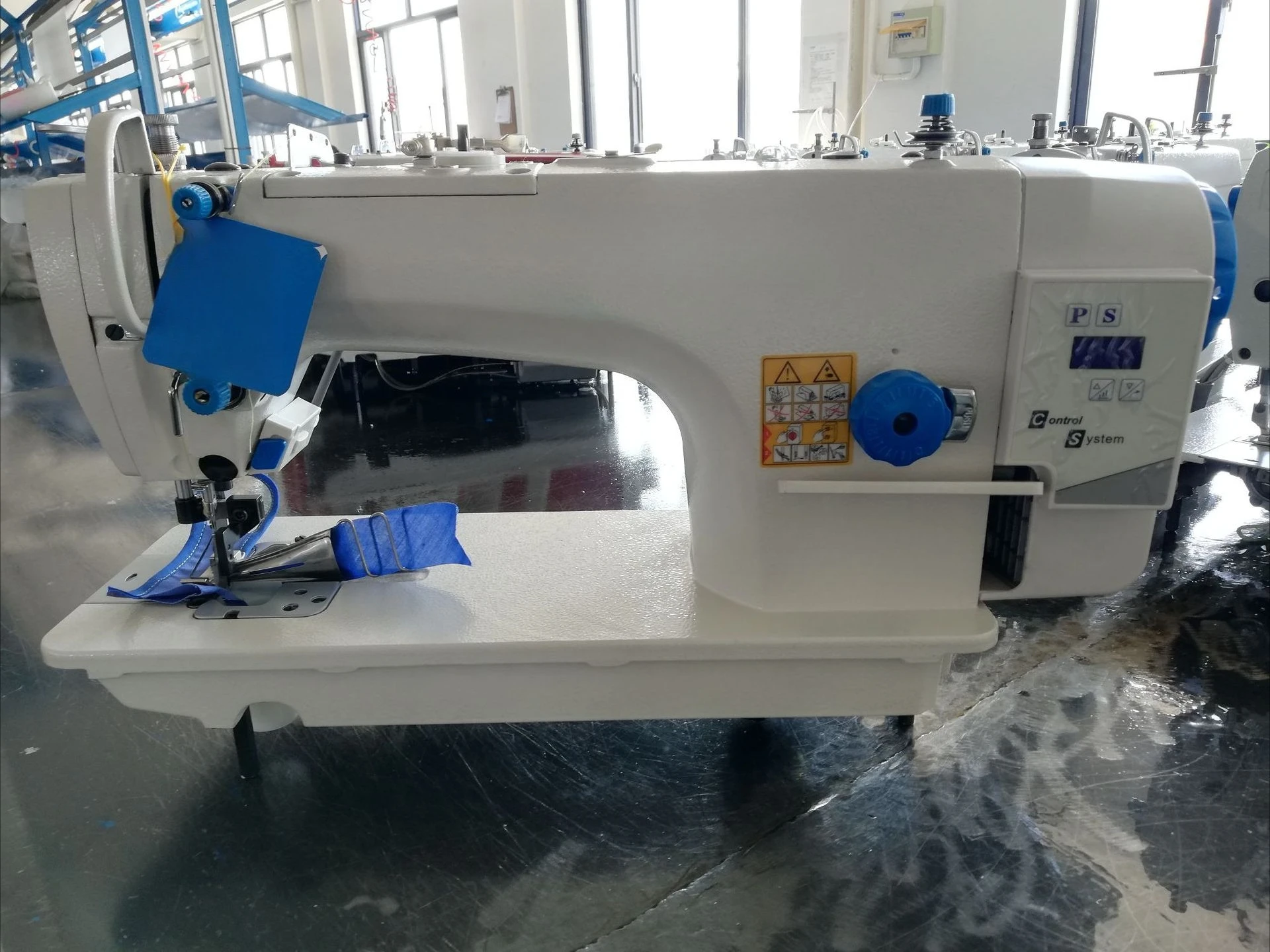 Computer direct drive high-speed belt and hemming sewing machine (integrated package cutting)