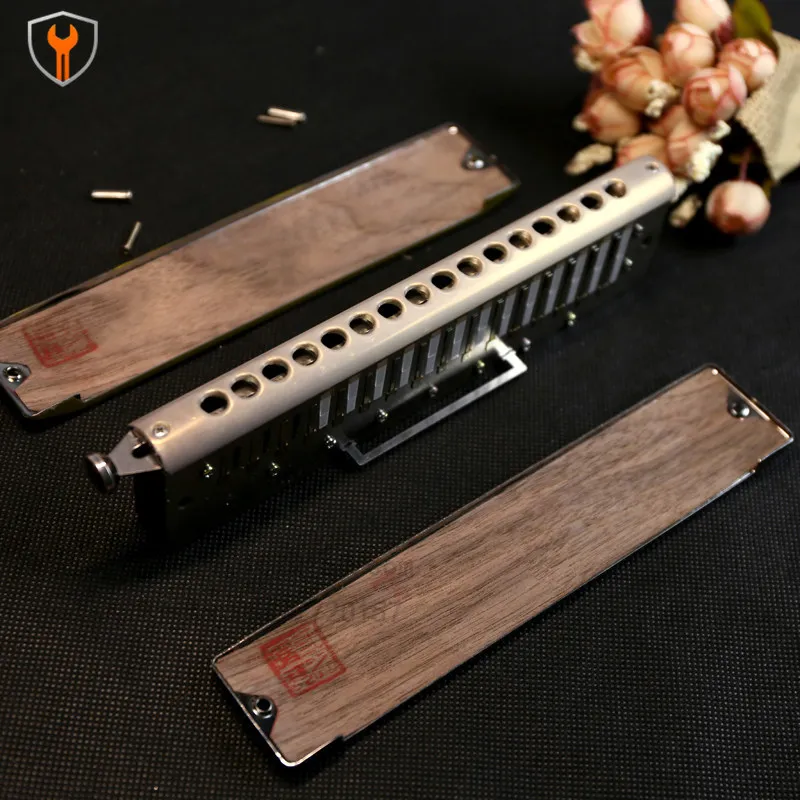 Chromatic harmonica tuning wood chips, natural black walnut
