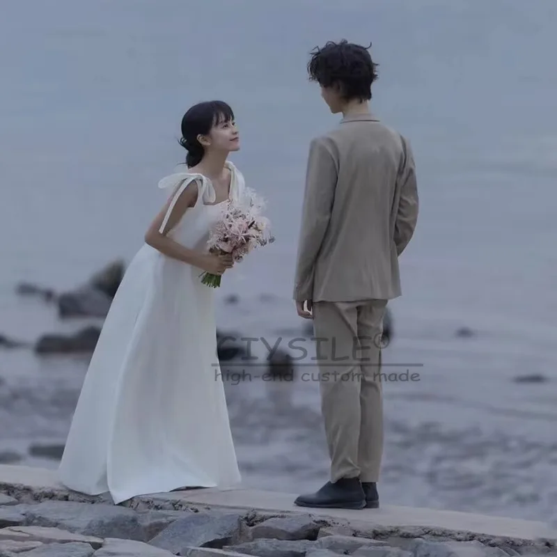 ชุดแต่งงานสีขาวแบบสั่งตัด GIYSILE คอเหลี่ยม แขนกุด แฟชั่น เซ็กซี่ ทรงเอไลน์  ชุดราตรีผ้าซาตินแบบสายเดี่ยว  สง่างาม