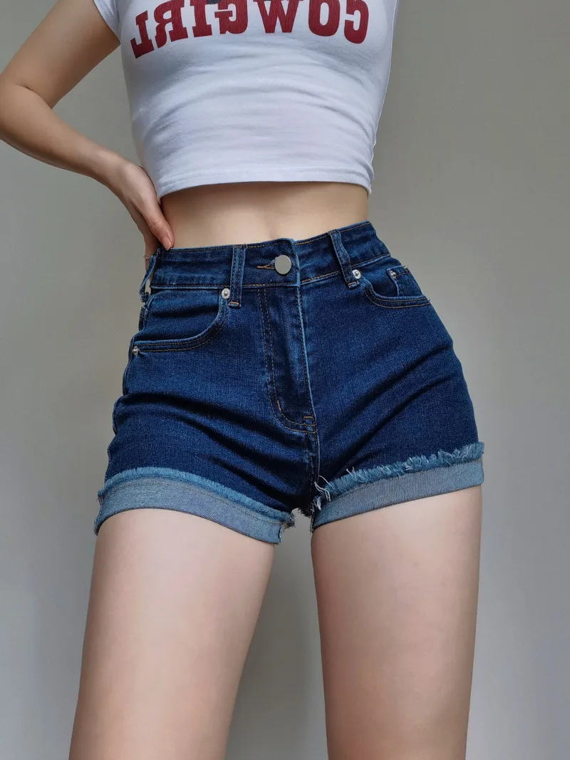 

American Style Spicy Girl High Waisted Denim Shorts Women's 2024 Summer New Elastic Wrap Hip Long Rolled Edges Slim Shorts XITN